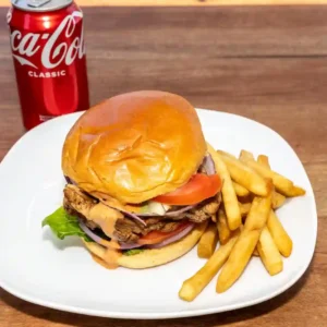 Chicken suya burger combo chips and a can drink